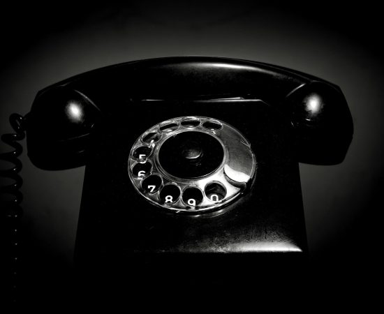 vintage-landline-telephone-with-a-handset-in-black-and-white-retro-dial-phone-in-a-low-key-free-photo